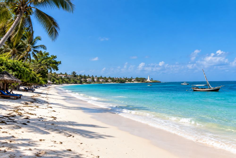 Pristine beach at Malindi with traditional Swahili architecture
